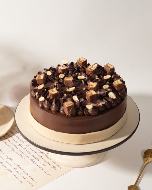 Decadent Snickers Cake
